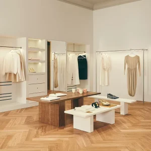 Showcase Women Clothing Store Fixture with Recessed LED Alcove Display and Gold Arch Mirror Turnkey Luxury Boutique Set